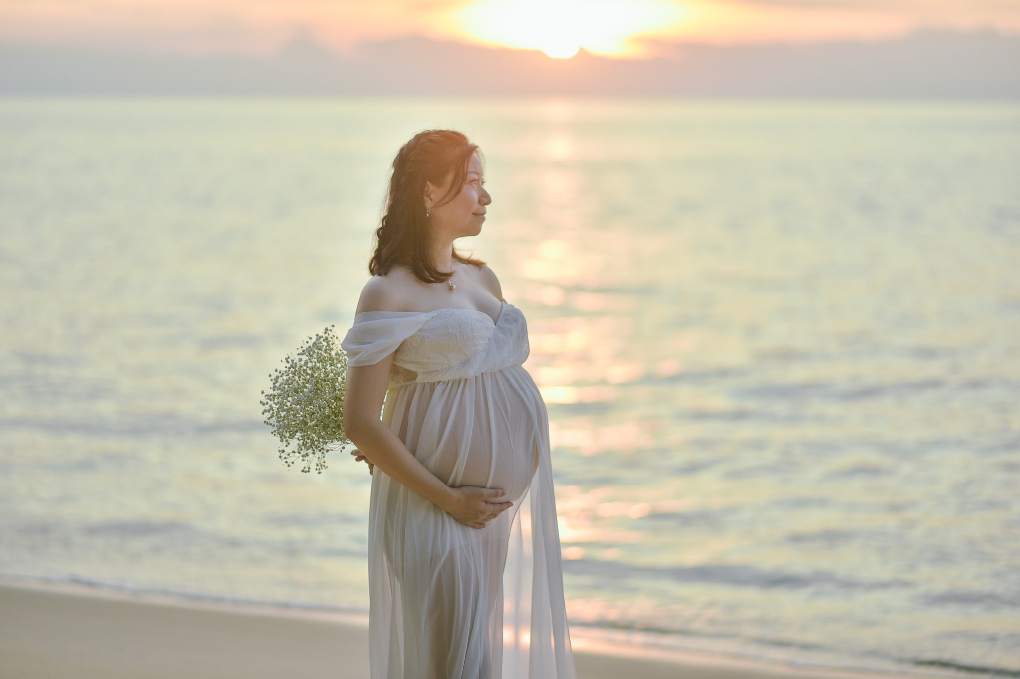 Maternity sunset with flowers