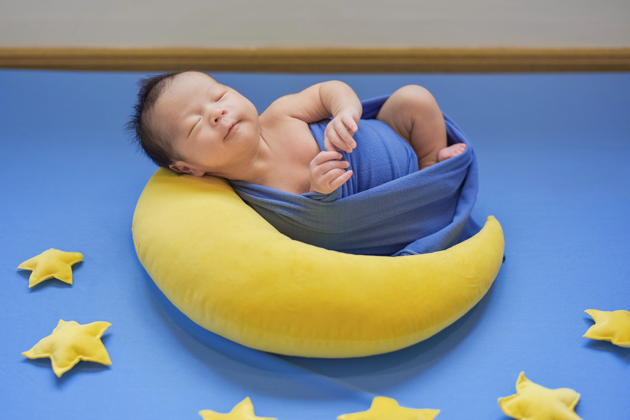 Newborn on moon prop